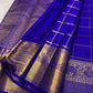 Grand antique gold zari pallu of Deep Violet Zari Kattam Kanchipuram saree with geometric weaving and ornate floral registers.