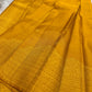 Handwoven golden turmeric Kancheepuram saree — full saree overview