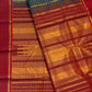 Green and cobalt blue handwoven Pure Silk Kanjivaram Kanchi Kattam saree with gold grid lines and red Rettapet border, full saree view