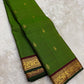 Pure silk Kancheepuram saree in emerald green with maroon zari border