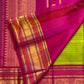 Luminous Vairaoosi zari stripes of varying widths on a green handwoven Kanchipuram silk saree.