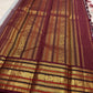 Rudraksham rows and peacock zari ornaments on the contrasting border of this Varisaipet saree