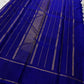 Traditional indigo Kanchi pattu silk saree with antique gold zari accents and richly woven texture