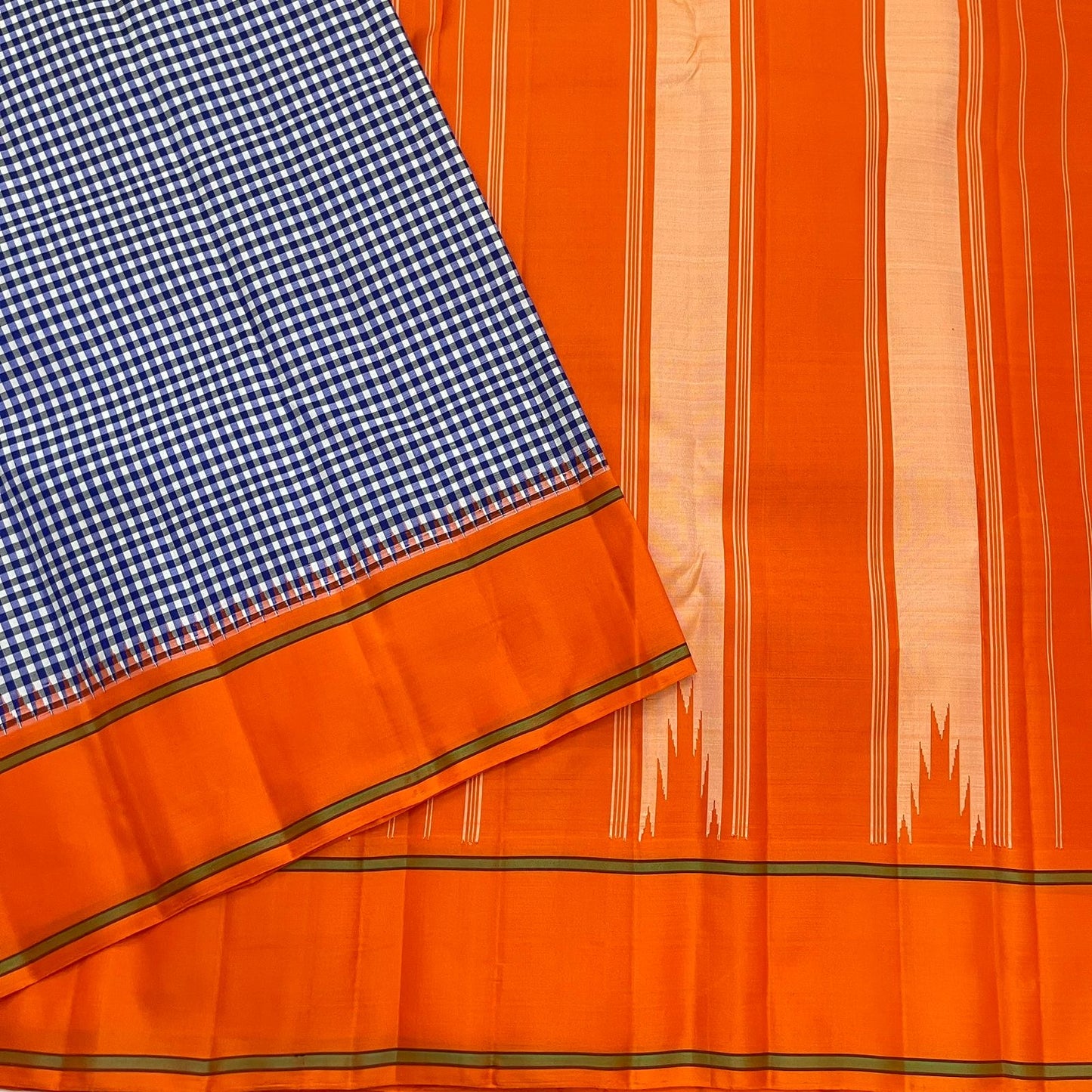 Orange pallu of navy white kattam Kancheepuram pure silk saree with Pillayar Reku antique gold zari