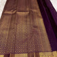 Deep grape purple Kancheepuram silk saree body close-up showing Maanga paisley and Mayil antique gold zari butta motifs