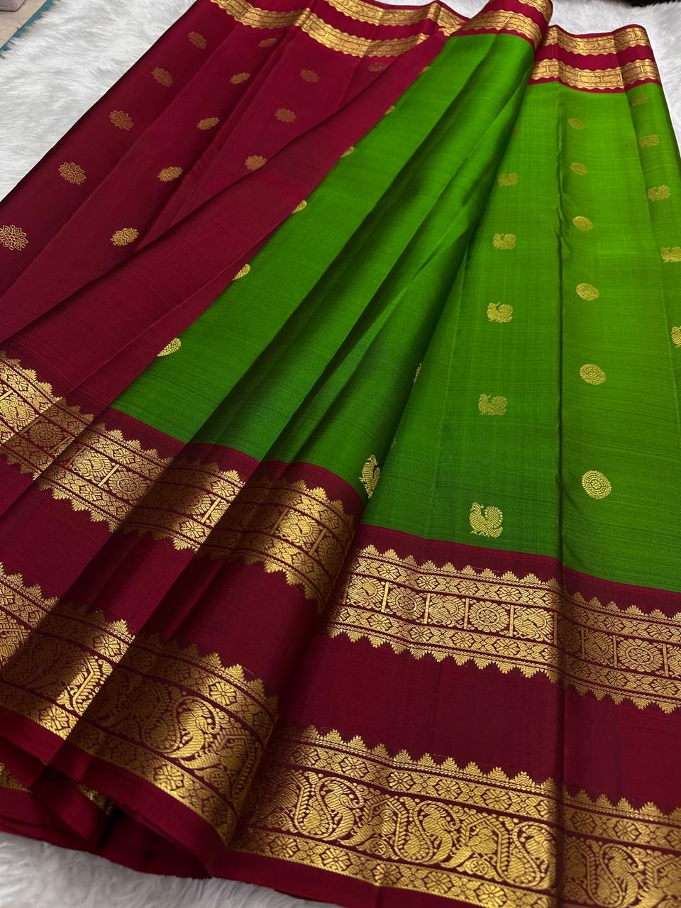 Handwoven Kancheepuram silk saree bright green body with deep ruby zari border Idam Living