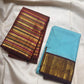 Handwoven Kanchi Kattam weave detail on the robin's egg blue Kancheepuram silk saree
