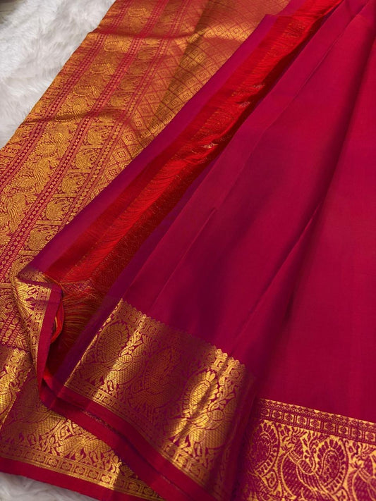 Deep Raspberry Pink Kanchipuram Silk Saree With Gold Zari Peacock Border And Mayil Chakram Butta