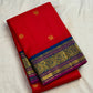 Royal-blue Korvai border on red handwoven Kanchipuram saree