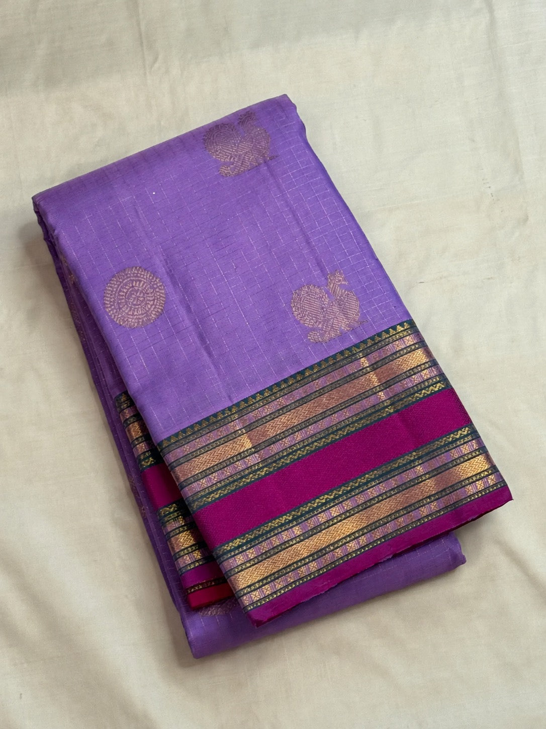 Clear lilac-lavender purple with fine gold checks pure silk Kanchipuram saree, purple pink handwoven kanchipuram silk; traditional Zari Kattam weave.