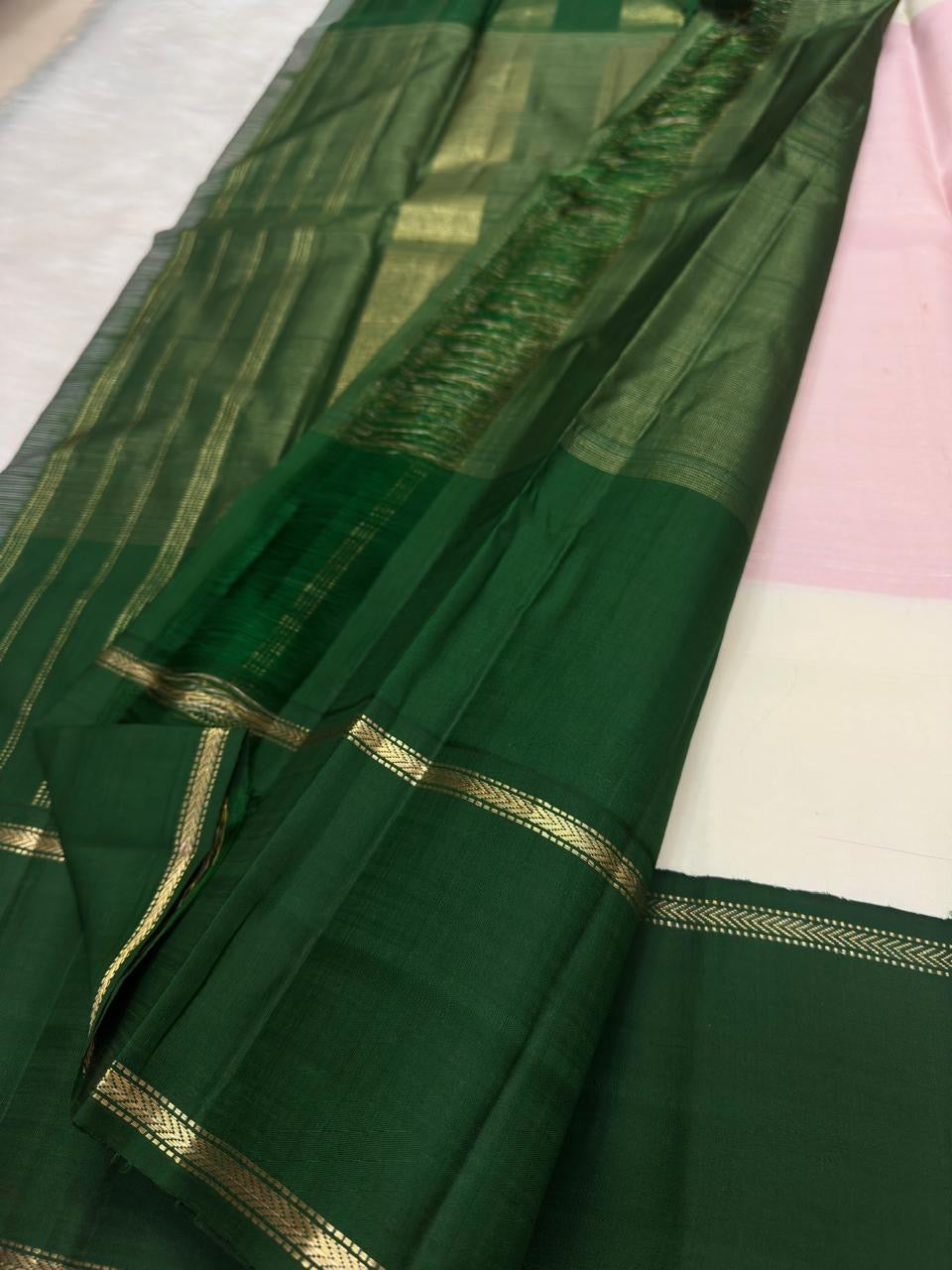 Temple-green border with Rettapet detailing on Kanchipuram silk