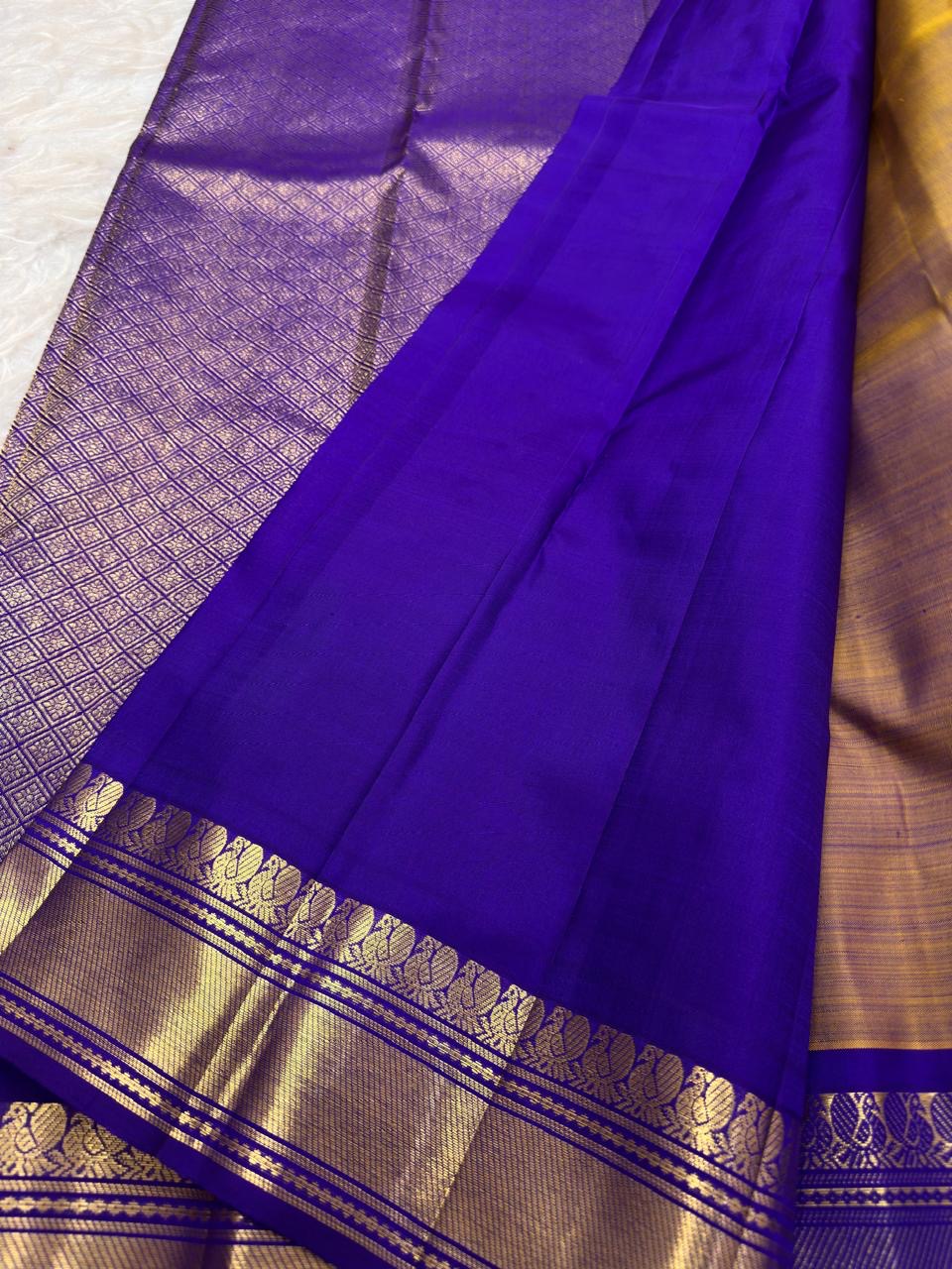 Handwoven Kanchipuram mustard gold pure silk saree with zari detailing, close view
