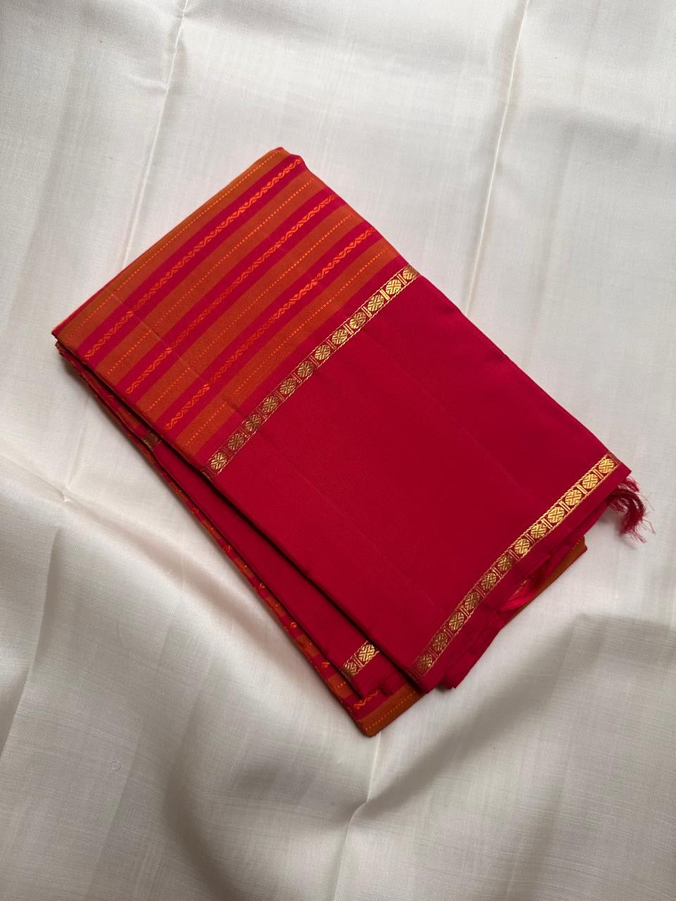 Turmeric Gold Handwoven Pure Silk Kanjipuram Saree with Rettapet Raspberry Pink Border