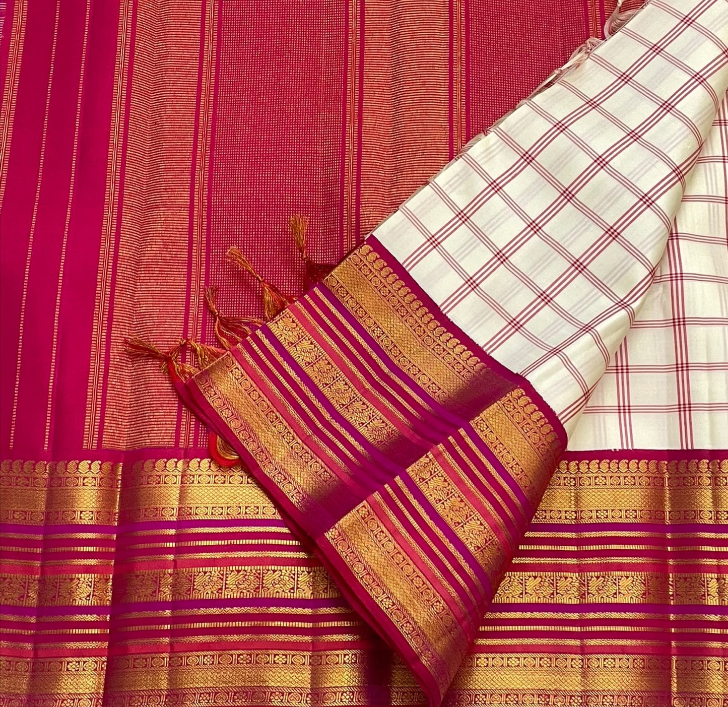 Handwoven Kanchipuram saree in ivory raspberry pink, draped view