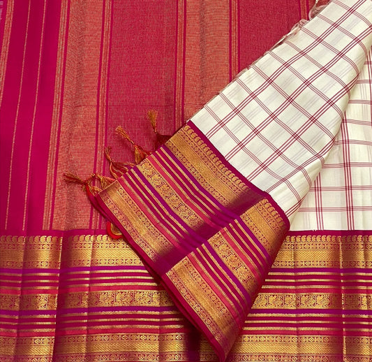 Handwoven Kanchipuram saree in ivory raspberry pink, draped view