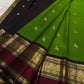 Emerald Green pure silk Kancheepuram saree, Butta weave with Deep Aubergine border — folded view
