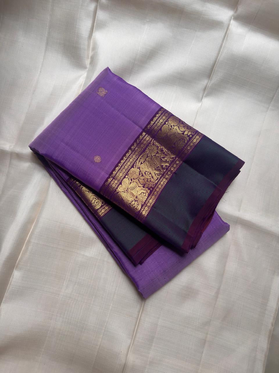 Orchid Lavender pure silk Kanjeevaram saree, Butta weave with Deep Purple border — full drape view