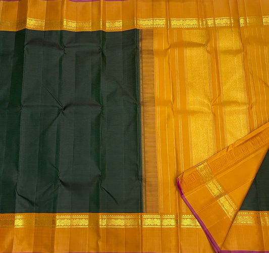 Green Kanchipuram silk saree with fine vairaoosi zari lines and mustard gold zari border