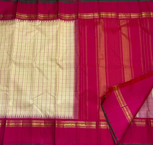 Cream ivory Pure Kanchipuram silk saree featuring structured kanchi kattam checks with classic gold zari kaal irangiya border