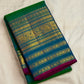 Iridescent peacock-neck blue and green pure silk Kanchipuram saree, mayil kazhuthu handwoven kanjipuram silk; traditional Varisaipet weave.