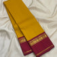 Handwoven pure silk Kanjeevaram saree in canary yellow with arakku red Korvai Kaal Irangiya paisley peacock border Silk Mark certified