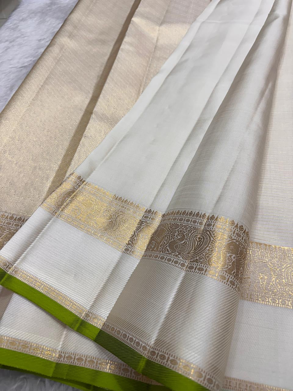 Handwoven Kancheepuram silk saree with antique gold zari detailing