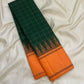 Orange Thazhampoo Reku border of forest green Kanjipuram saree with antique gold zari temple edge and Varisaipet bands