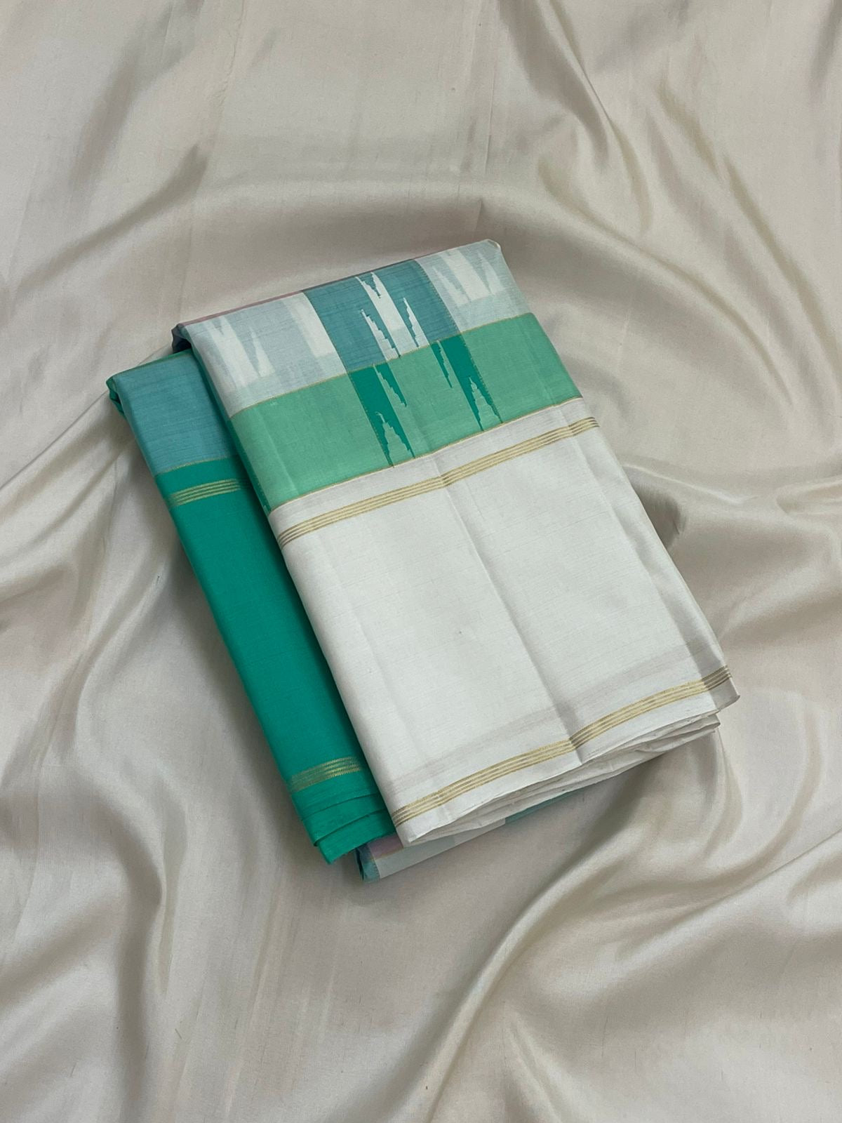 Off-white Ganga Jamuna border of Paalum Pazhamum Kanjivaram saree with fine gold zari Varisaipet lines