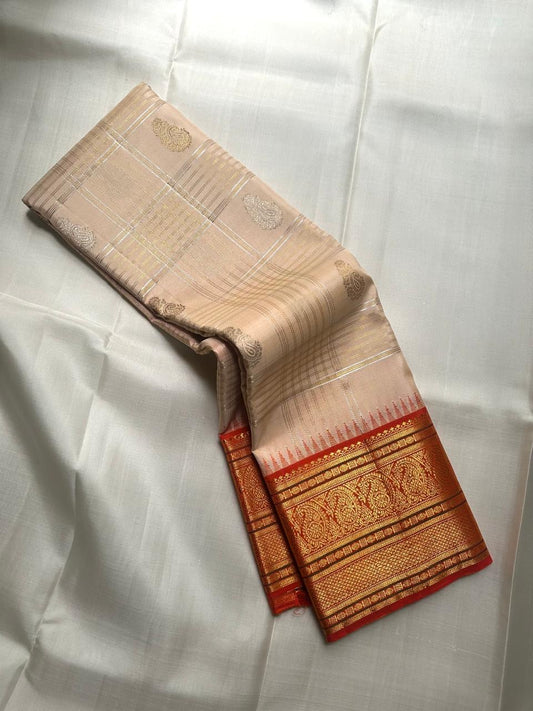 Handwoven ivory Pure Silk Kanchi Pattu saree with Korvai weave