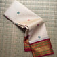 Handwoven Korvai Kancheepuram silk saree, Varisaipet border with floral buttas close-up