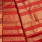 Close view of glowing kungumam red pure silk with fine needle-like Vairaoosi lines