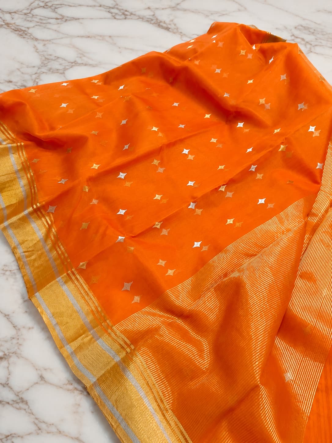 Handwoven pure silk Chanderi saree in vibrant citrus orange tones
