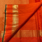 Deep Bottle Green selvedge framing the Orange body.