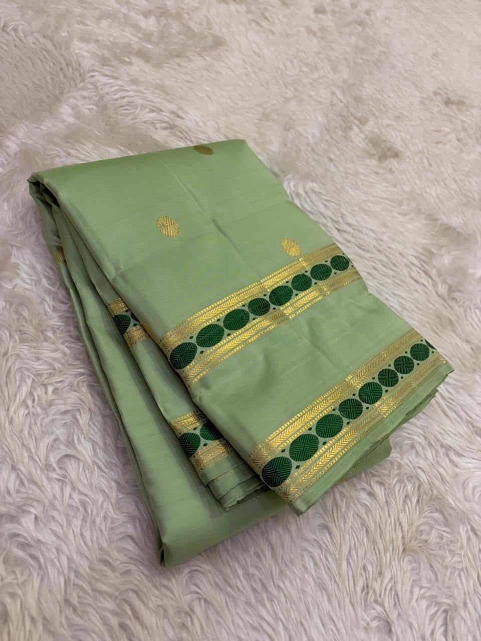 Pastel sage green Kanjeevaram silk saree, full drape