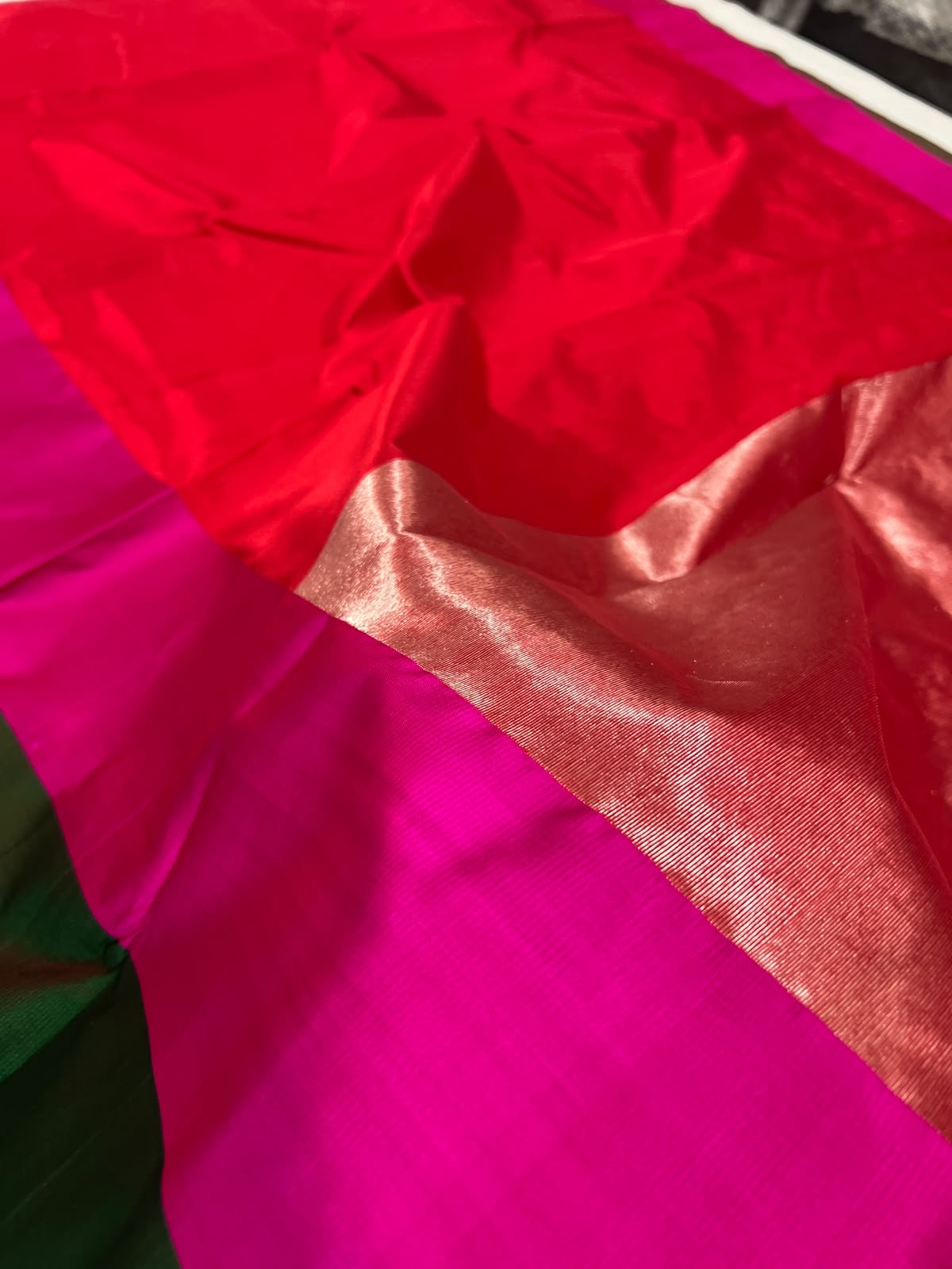 Red Chanderi saree with broad emerald green and rani pink colour-block border