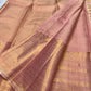 Handwoven Soft Peach Blush Pure Silk Kanchipuram Zari Kattam saree draped to show the fine gold checked body and antique-gold border.