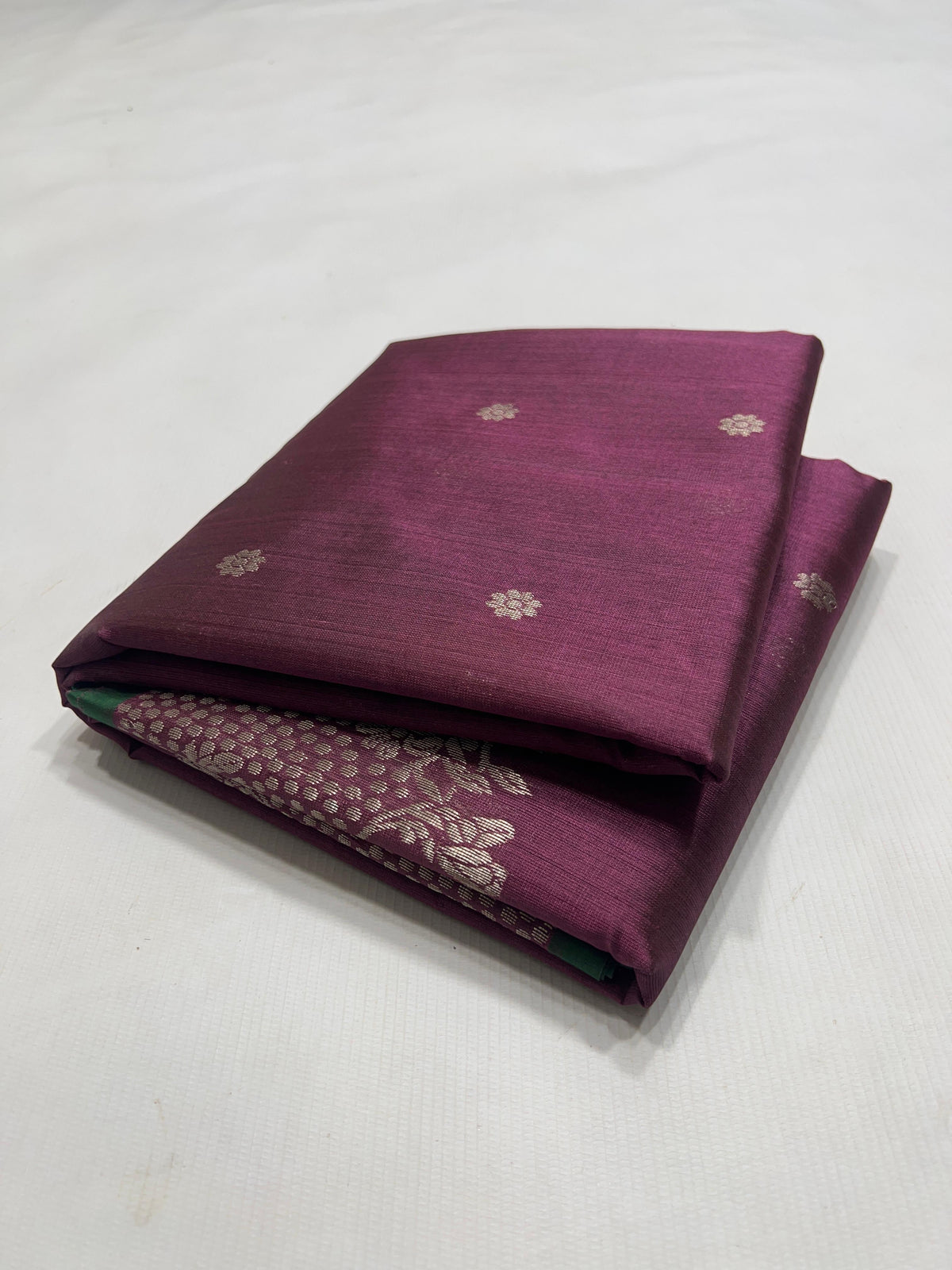 Handwoven plum Pure Silk Chanderi saree with bird motifs