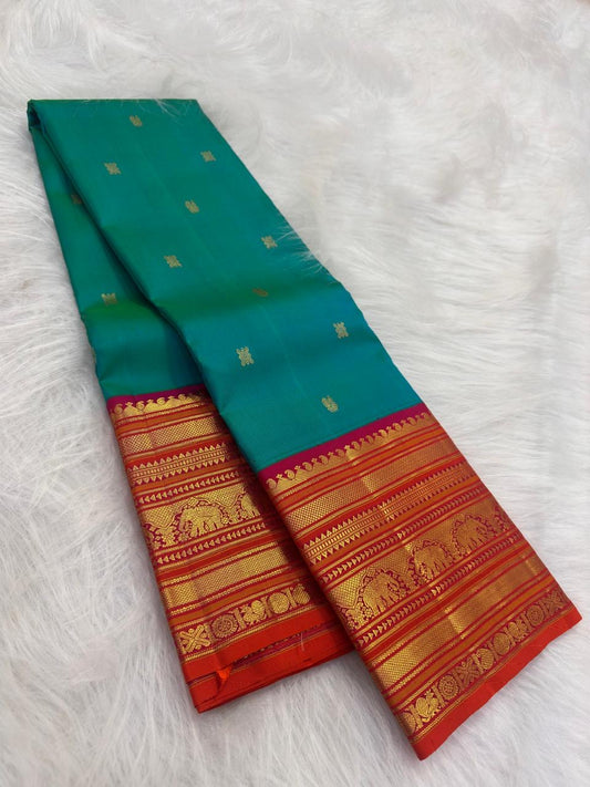 Peacock Teal KanchiPattu silk saree with vermilion border detail