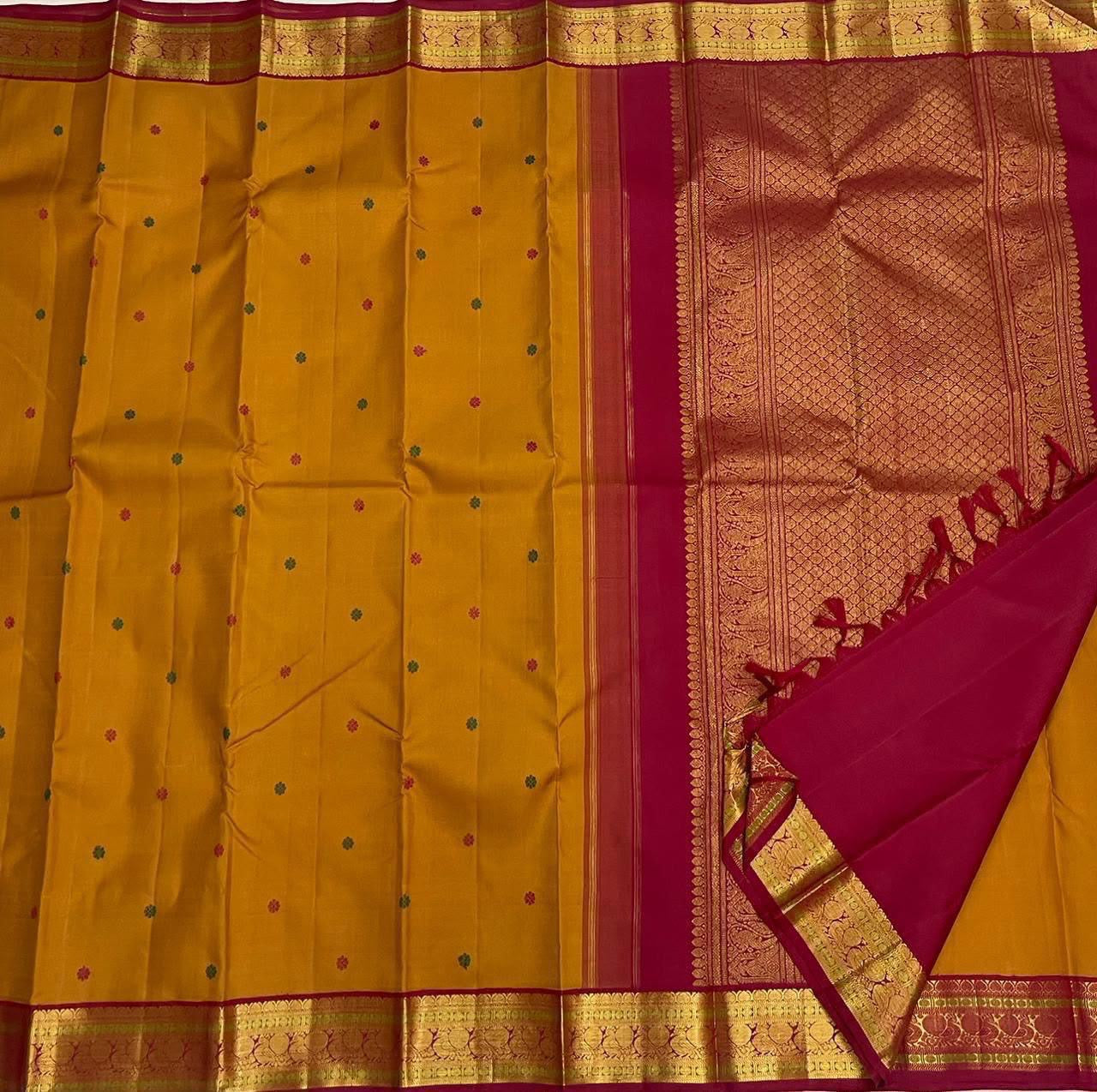 Raspberry pink pallu with gold zari peacock detailing, KanchiPattu silk saree