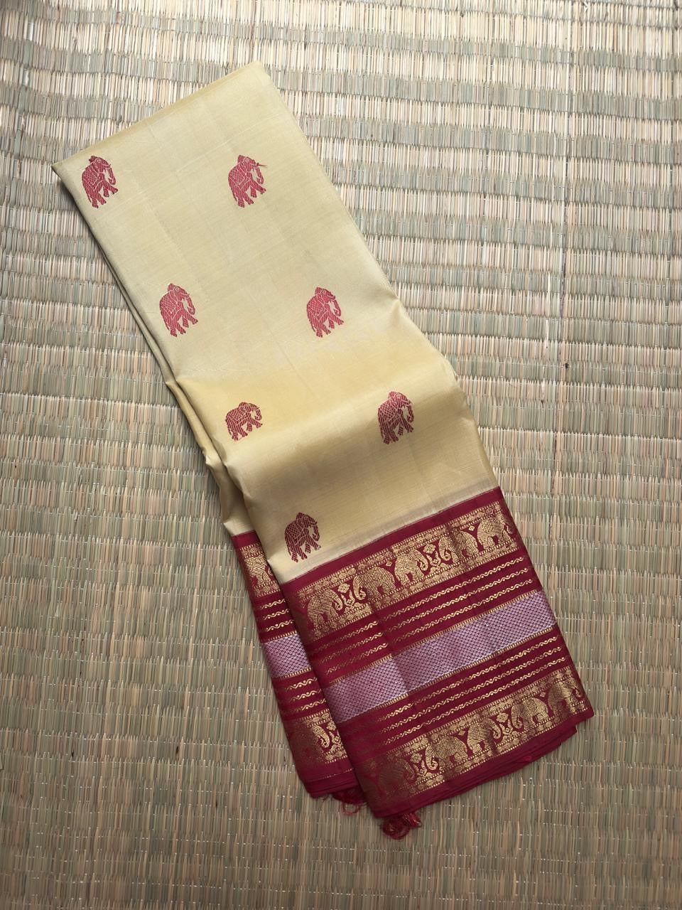 Handwoven ivory Pure Kanchipuram Korvai silk saree with elephant silk thread buttas — Idam Living