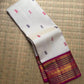 Handwoven ivory Pure Kanjivaram Korvai silk saree with peacock silk thread buttas