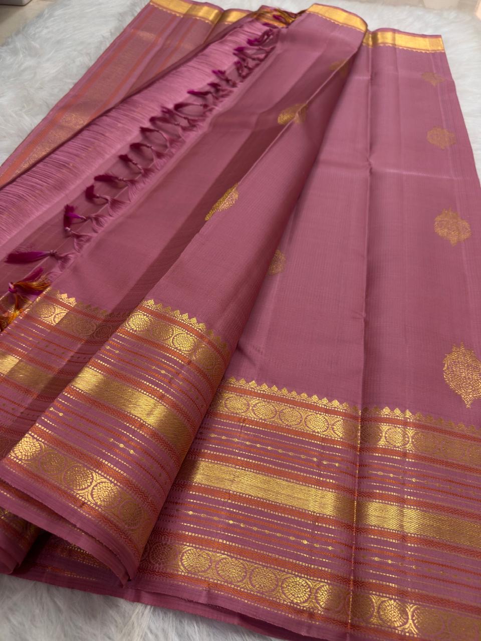Exclusive Peacocks on Throne zari motif on orchid pink Kanchi Pattu silk
