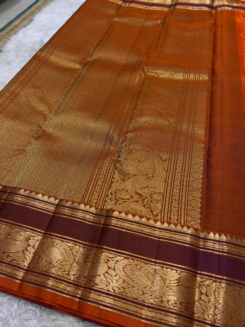 Burgundy Deep Coffee Brown and Orange Handwoven Pure Silk Kanjivaram Saree with Kamalam Butta and Silk Thread Zari Border