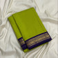 Folded Elumichai Pachai Kanchipuram saree showing fine checks and Kathiripoo purple border