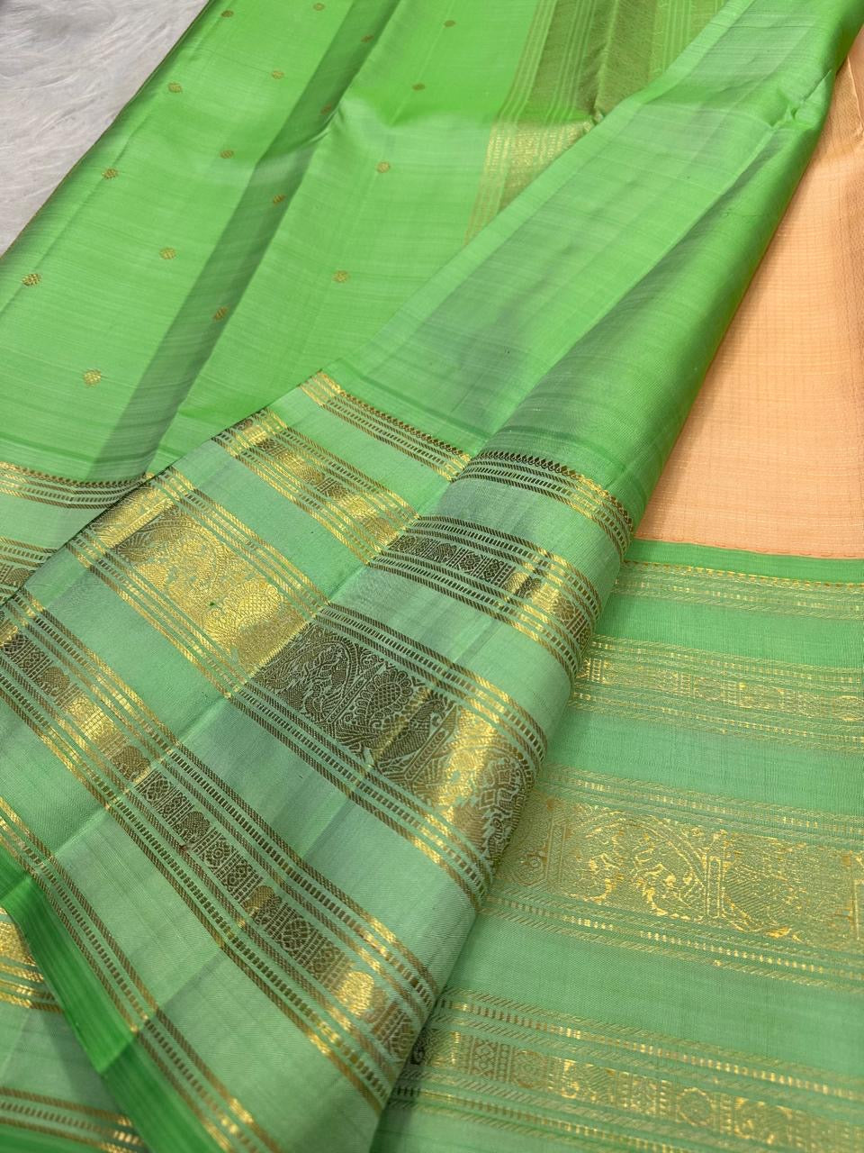 Champagne Peach Handwoven Pure Silk KanchiPattu Saree with Varisaipet Weave and Mint Green Zari Border