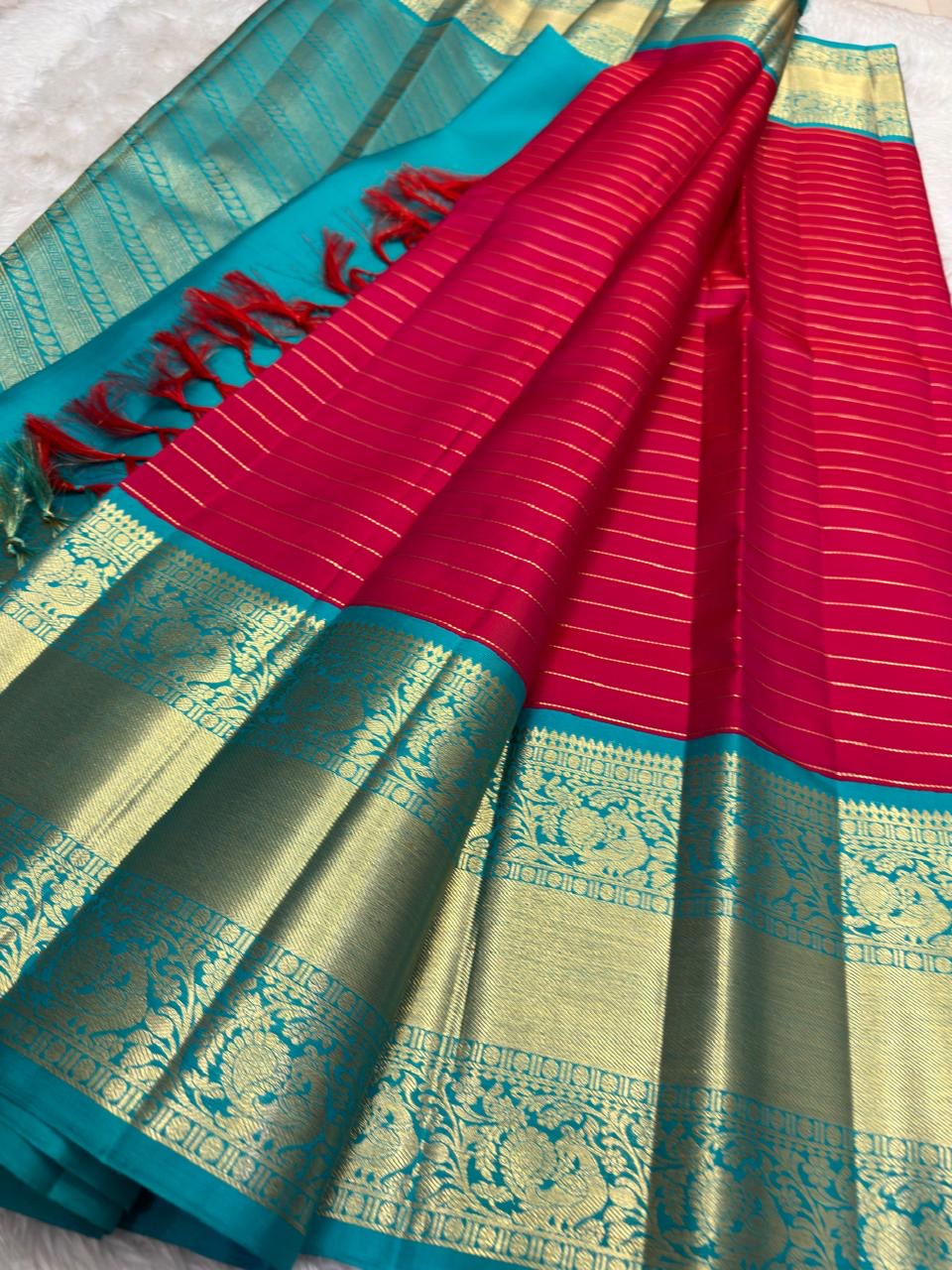 Raspberry Pink pure silk Kanjeevaram saree, Korvai weave with Peacock Teal Zari border — blouse piece detail