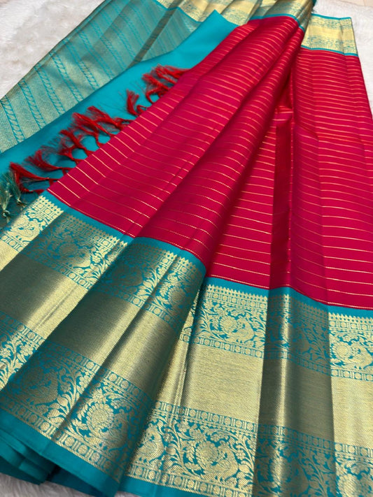 Raspberry Pink pure silk Kanjeevaram saree, Korvai weave with Peacock Teal Zari border — blouse piece detail