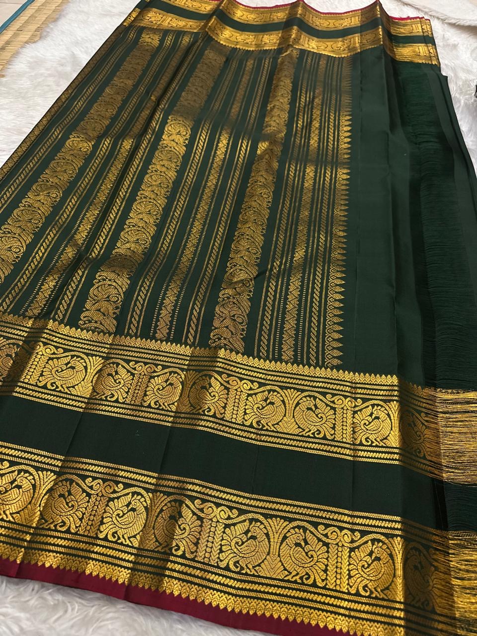 Bottle Green and Arakku Red Handwoven Pure Silk Kanjipuram Saree with Rettapet Yaanai Chakram Butta and Annam Pallu Border