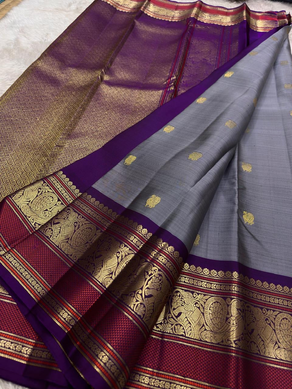 Steel Grey and Kanchana Purple Handwoven Pure Silk Kanchipuram Saree with Mayil Butta and Vanasringaram Yaanai Border