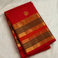 Radiant vermilion red reminiscent of temple kumkum pure silk Kanchipuram saree, handwoven red zari checks saree; traditional Zari Kattam weave.